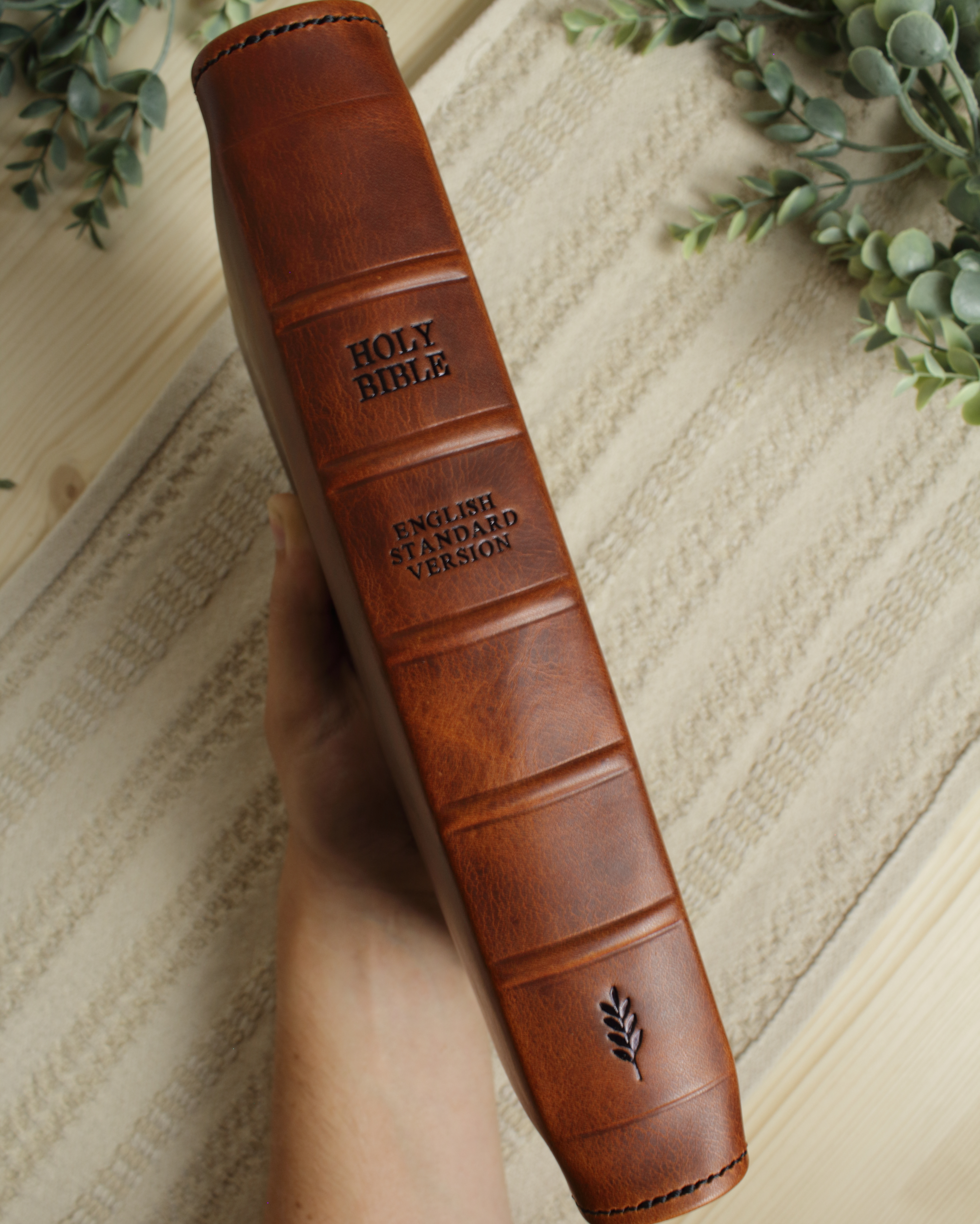 Raised hubs on a brown leather Bible spine